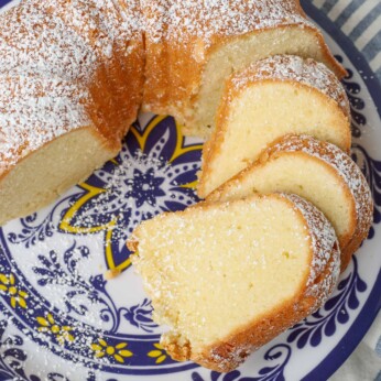 sliced bundt cake on printed blue plate