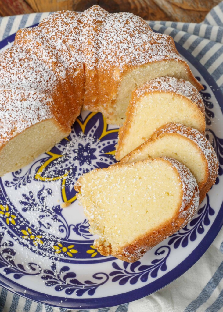 sliced bundt cake on printed blue plate