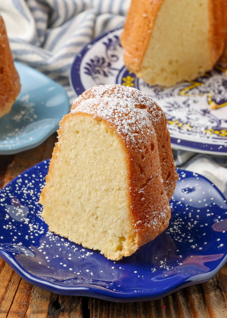 slice of cream cheese pound cake on small blue plate