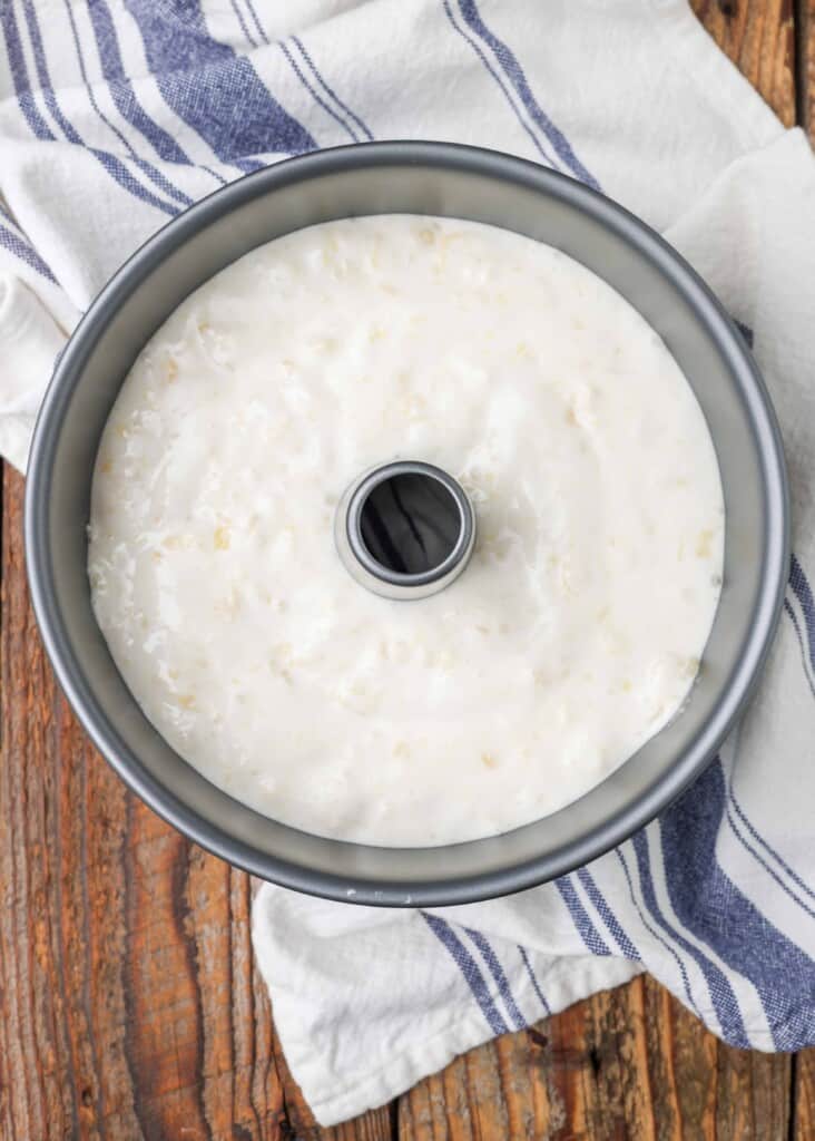 unbaked pineapple angel food cake in a tube pan