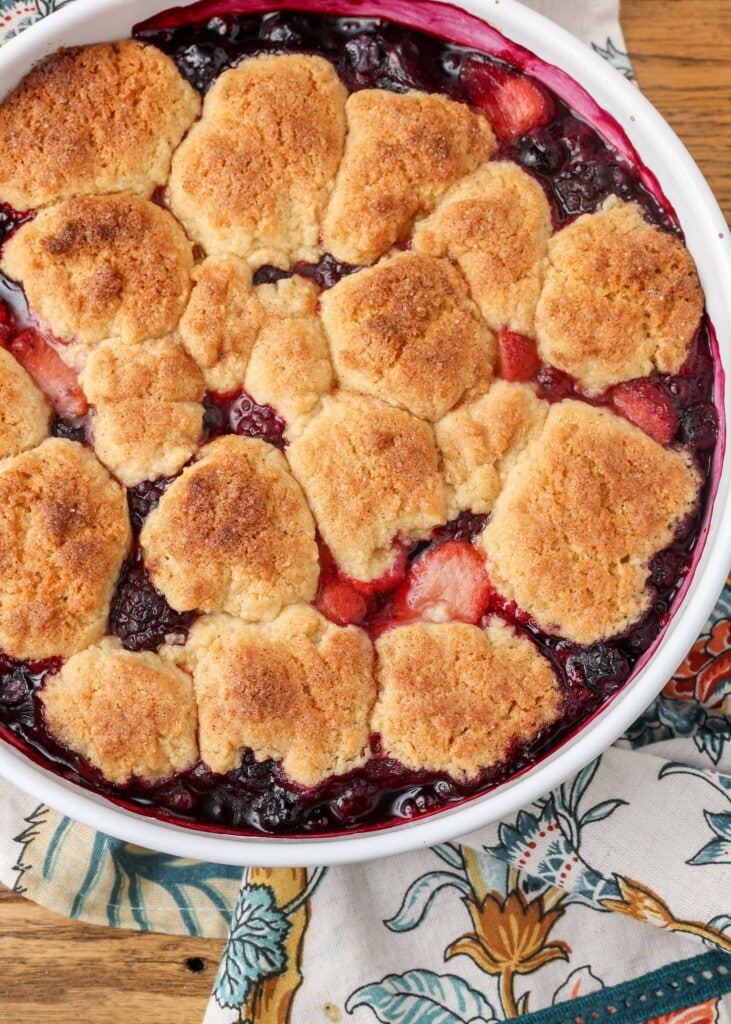 bubbling fruit cobbler on floral towel