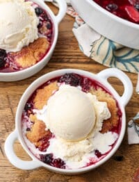 overhead photo of berry cobbler with ice cream