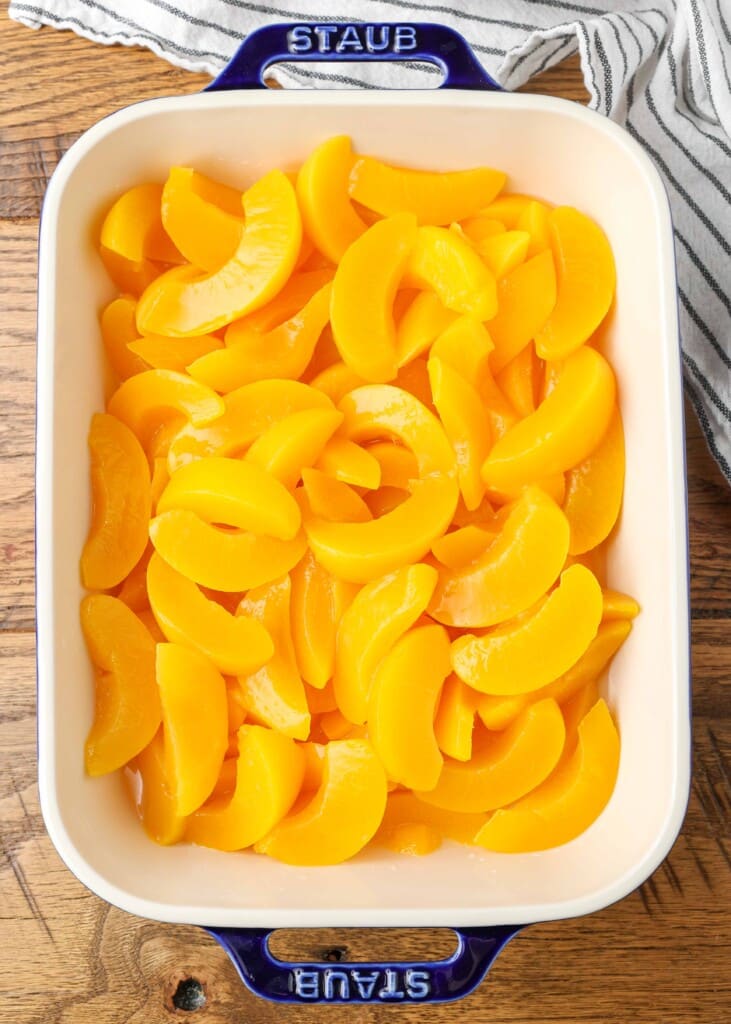 canned peaches in baking dish