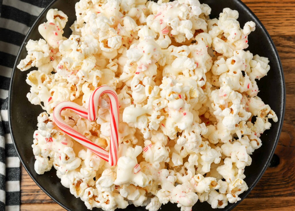 chocolate drizzled popcorn with candy canes