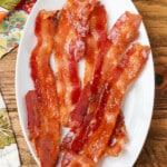 brown sugar candied bacon on oval plate