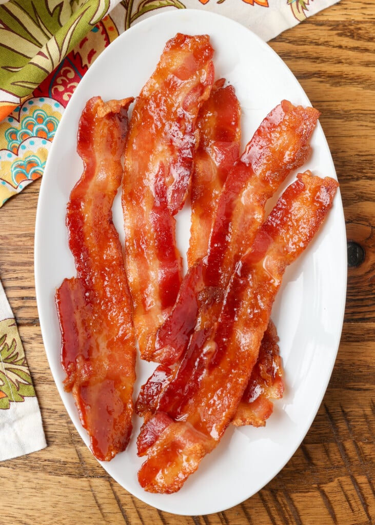 brown sugar candied bacon on oval plate