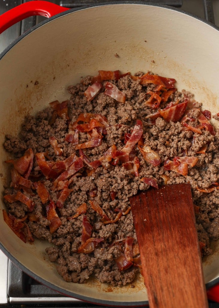 ground beef and bacon in dutch oven