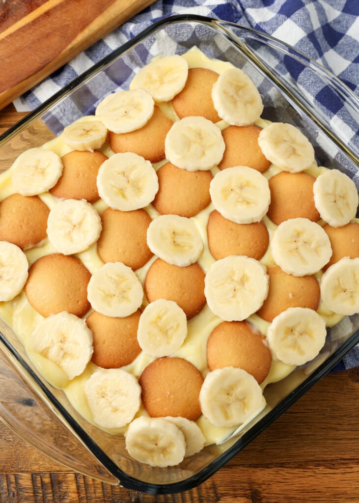 layered pudding and wafer cookies in baking dish