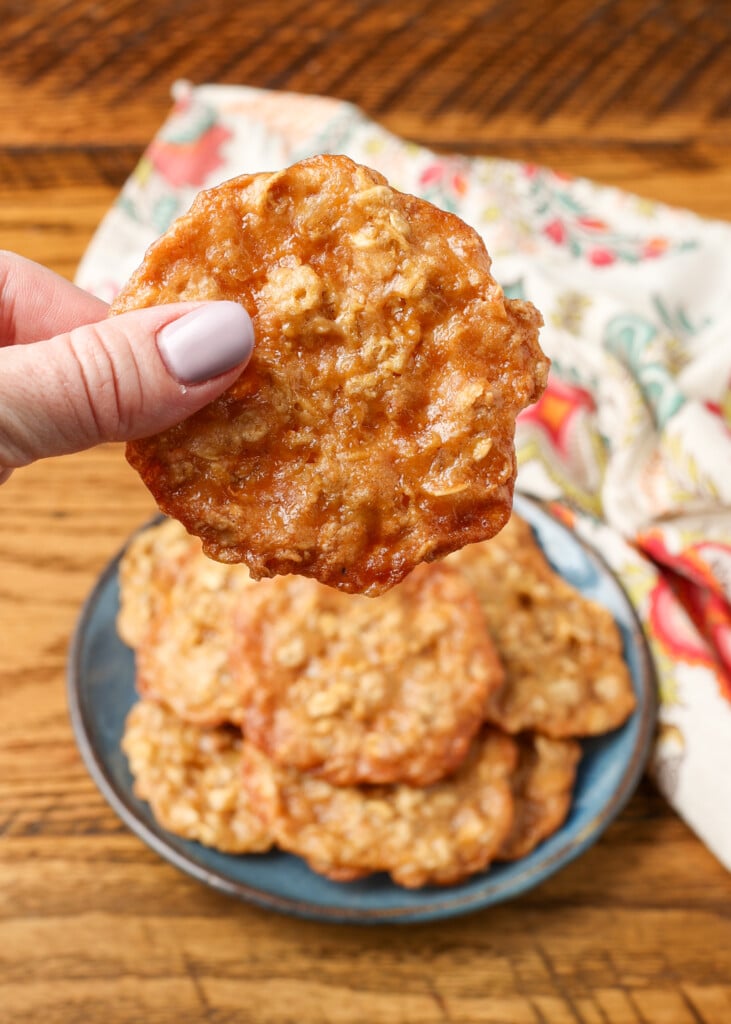 lacey thin oatmeal cookies held in hand
