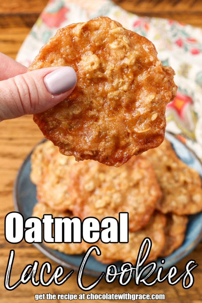 thin oatmeal cookies, held in hand over plate of cookies