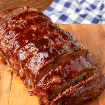 meatloaf with glaze on cutting board