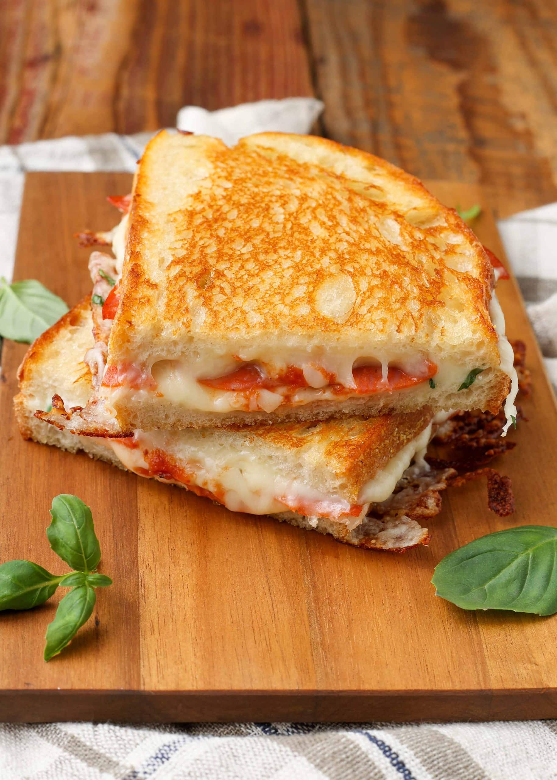 https://chocolatewithgrace.com/wp-content/uploads/2025/04/Pizza-Grilled-Cheese-CWG-6-1-of-1-scaled.jpg