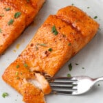 brown sugar salmon on a plate with a fork
