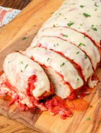 chicken parmesan meatloaf on a cutting board