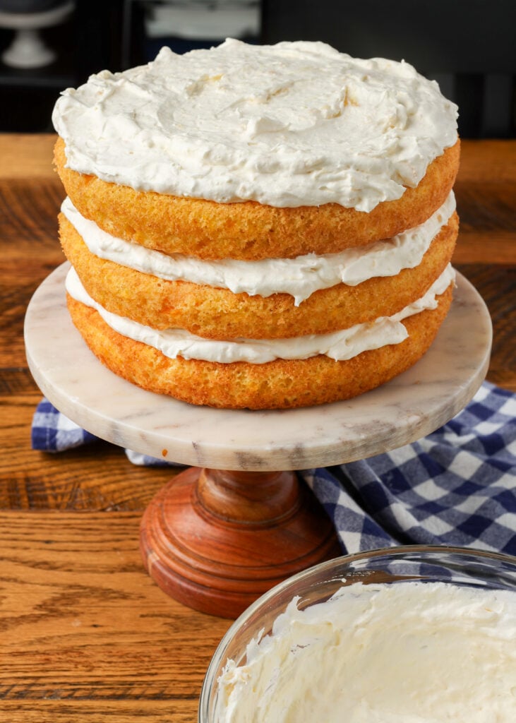 naked cake with top but not sides frosted