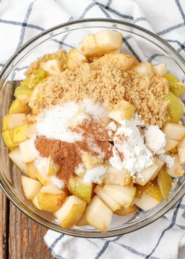 Pear Cobbler ingredients in glass mixing bowl