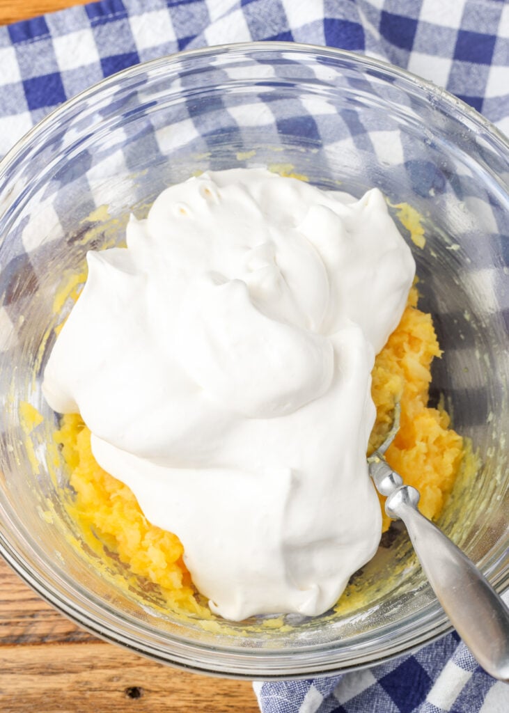 whipped topping added to bowl